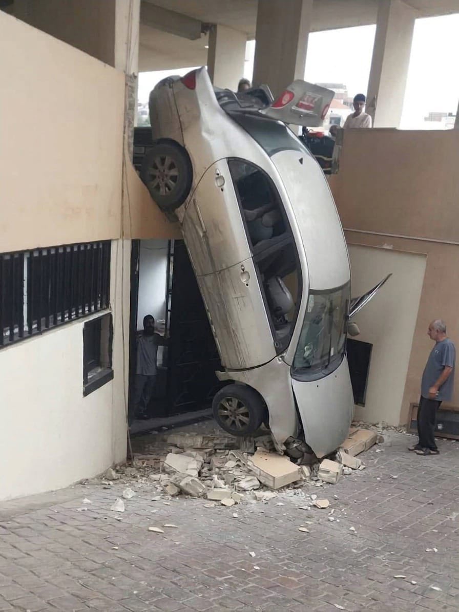 A car overturns inside a garage in Aramoun, Aley District